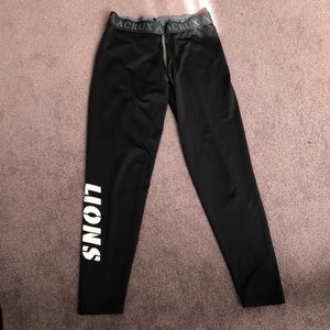 Black running tights/leggings w Lions, small
